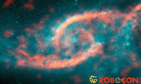 Cấu trúc giống hình con mắt xuất hiện do cú va chạm mạnh giữa hai thiên hà. Ảnh: NASA/ ESA