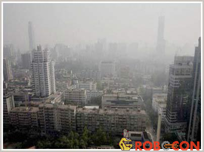 Nhóm “chuyên gia ngửi” sẽ góp phần hạn chế ô nhiễm môi trường và bảo vệ sức khỏe con người. Trong ảnh: thành phố Quảng Châu trong làn sương khói (Ảnh: Reuters)